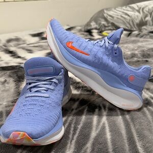 Nike Blue Knit Running Shoes with Orange Swoosh